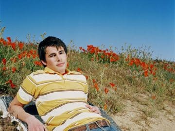 poppy field plants man