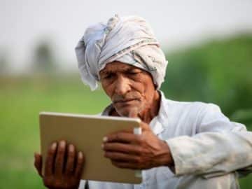 india farmer thinking reading