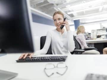 trader woman computer phone