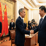 “Canadian Prime Minister Mark Carney shaking hands with Chinese President Xi Jinping inside the Great Hall of the People in Beijing during high-level trade talks on EV and canola tariffs.”