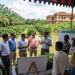Stakeholders at a plantation crops symposium discussing climate challenges in Indian agriculture